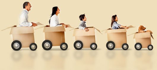Family Moving in Cardboard Boxes